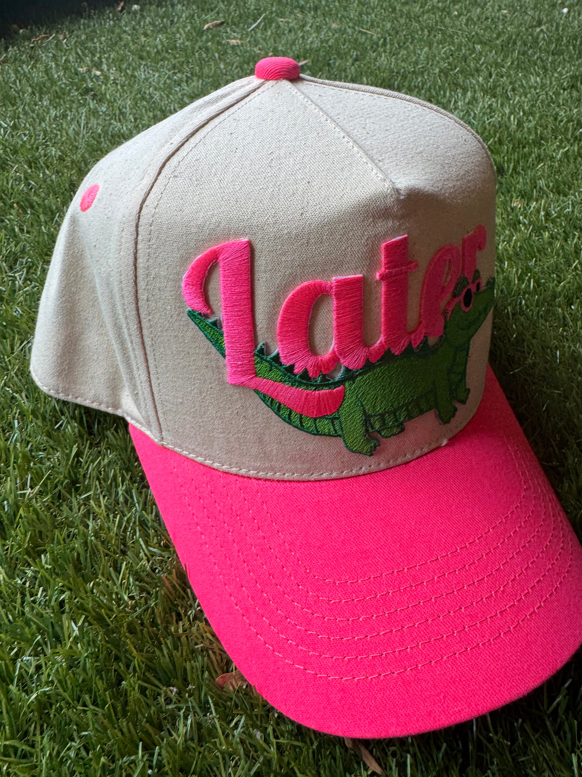Later Gator on neon pink canvas trucker hat