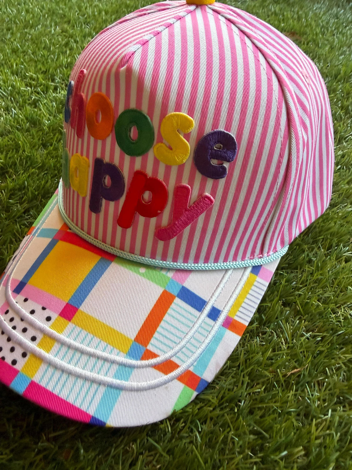 CHOOSE HAPPY embroidered word patch on this custom canvas trucker hat