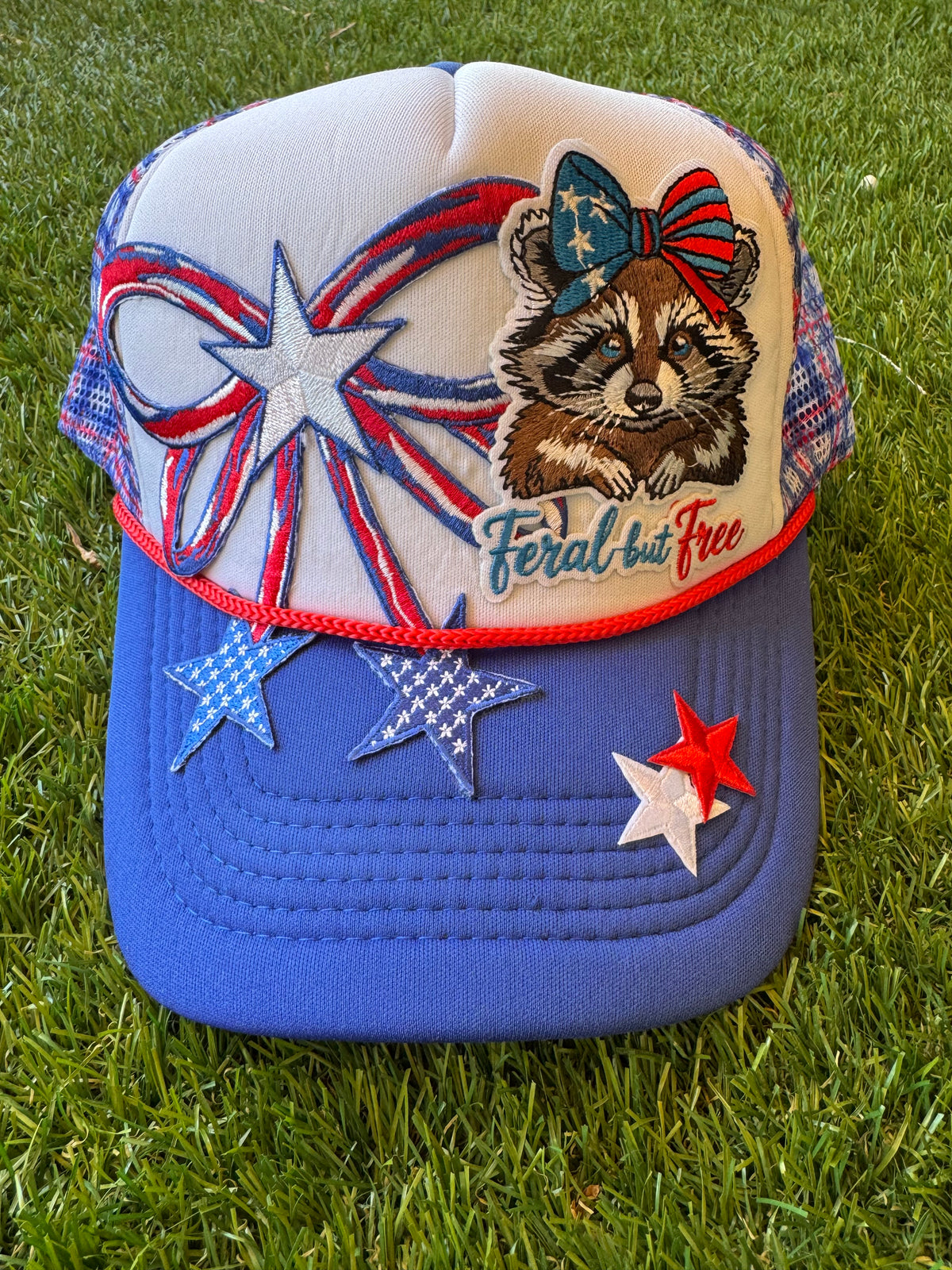 Feral but Free with large USA theme bow trucker hat