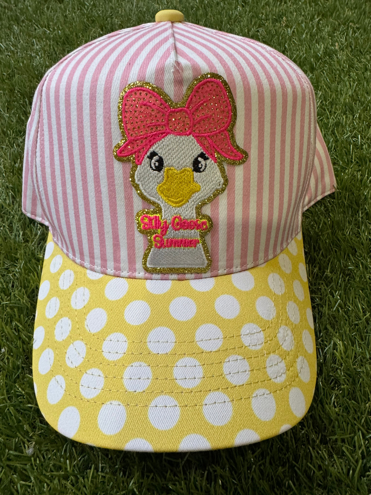 Silly Goose Summer on pink and white strip canvas hat with yellow and white polka dot brim