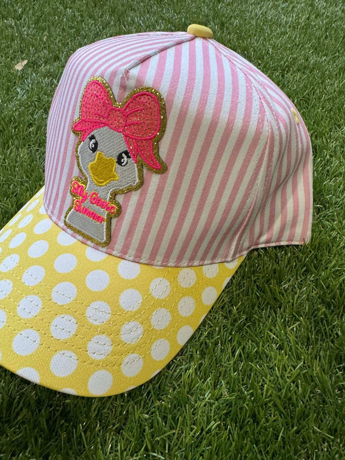 Silly Goose Summer on pink and white strip canvas hat with yellow and white polka dot brim