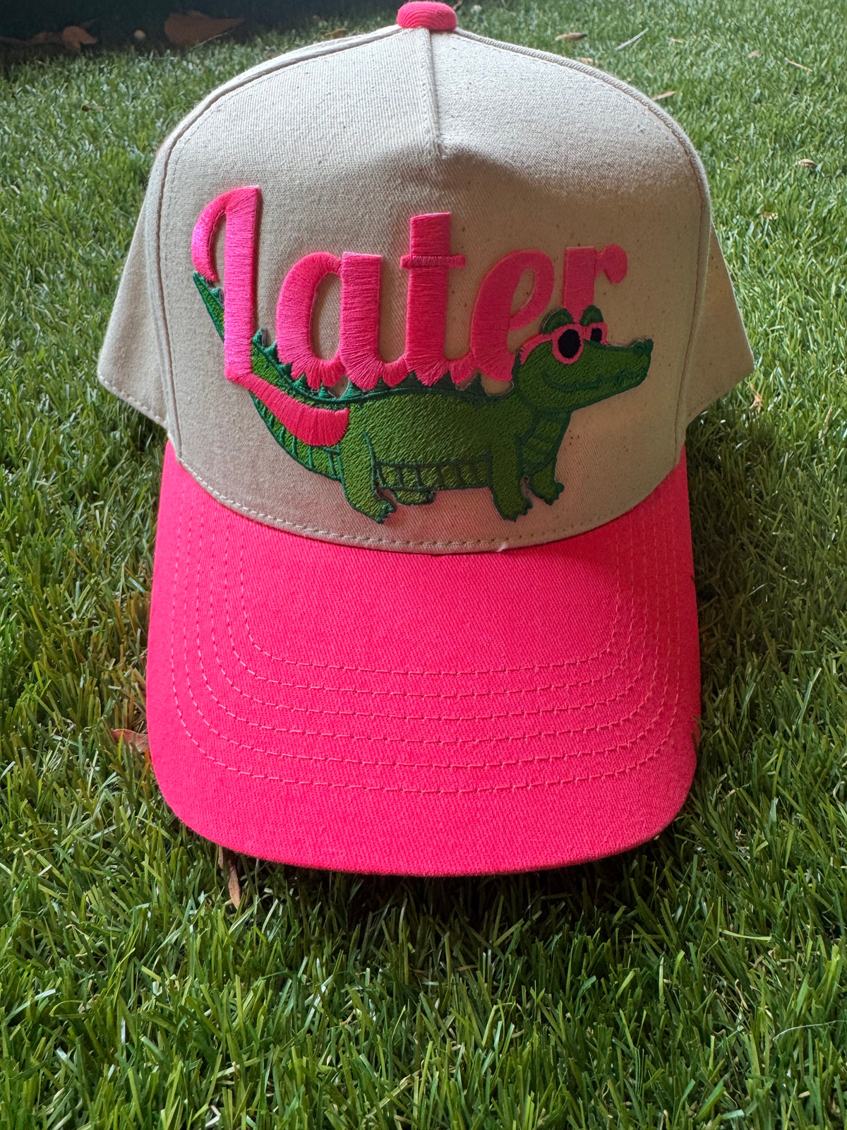 Later Gator on neon pink canvas trucker hat