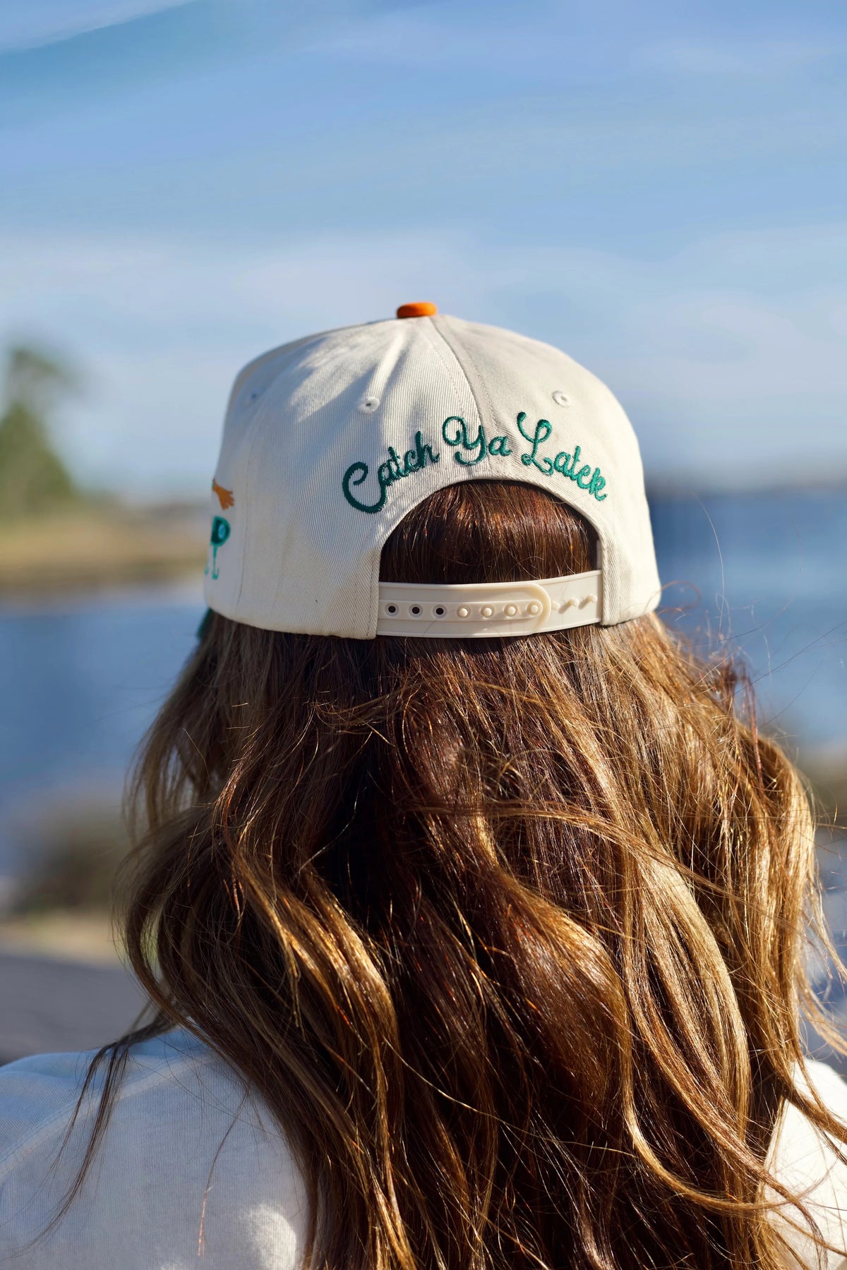 Gone Fishin' embroidered hat with embroidery side details and Catch Ya Later embroidered on back
