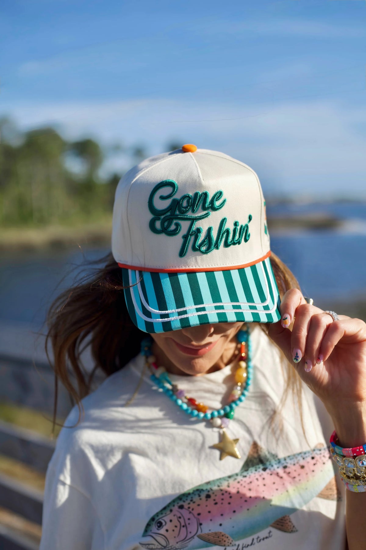 Gone Fishin' embroidered hat with embroidery side details and Catch Ya Later embroidered on back
