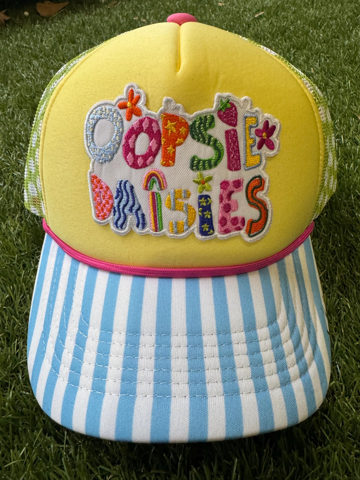Oopsie Dasies on custom trucker hat with magna pony