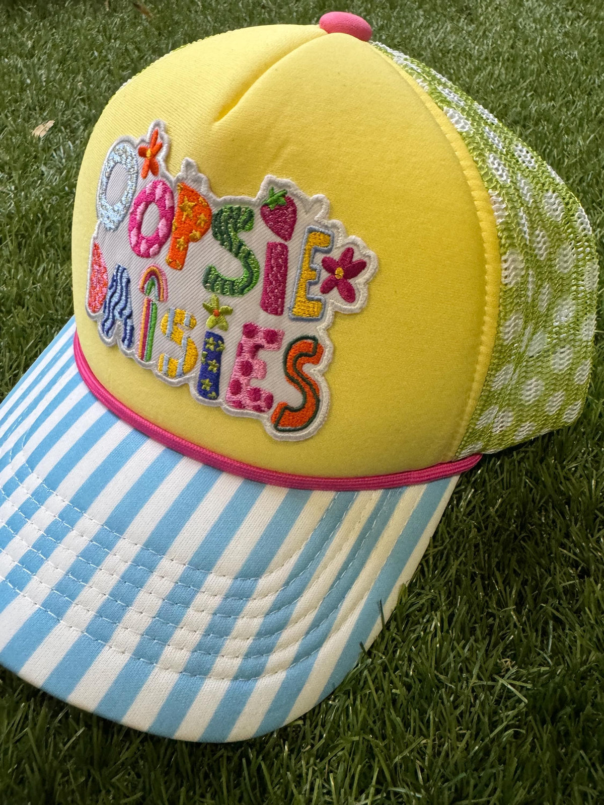 Oopsie Dasies on custom trucker hat with magna pony