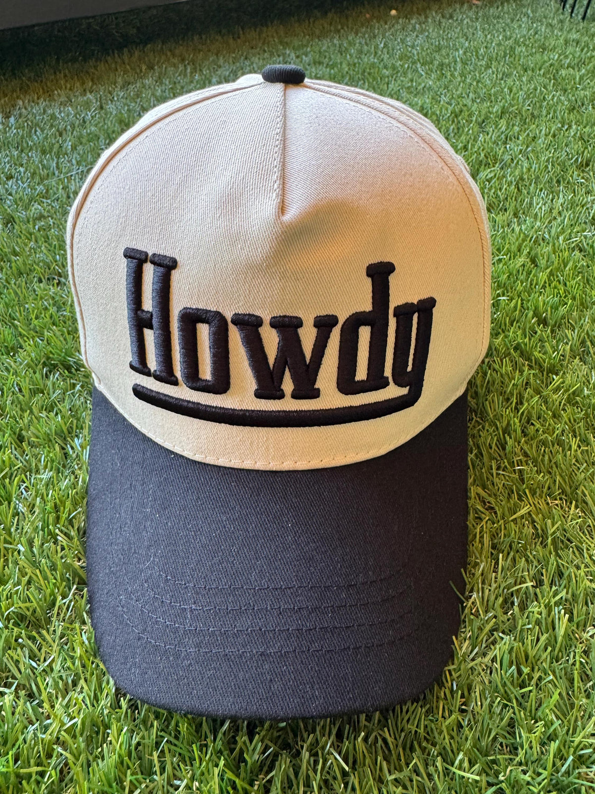 HOWDY embroidered canvas trucker hat with cowboy embroidered detail on side