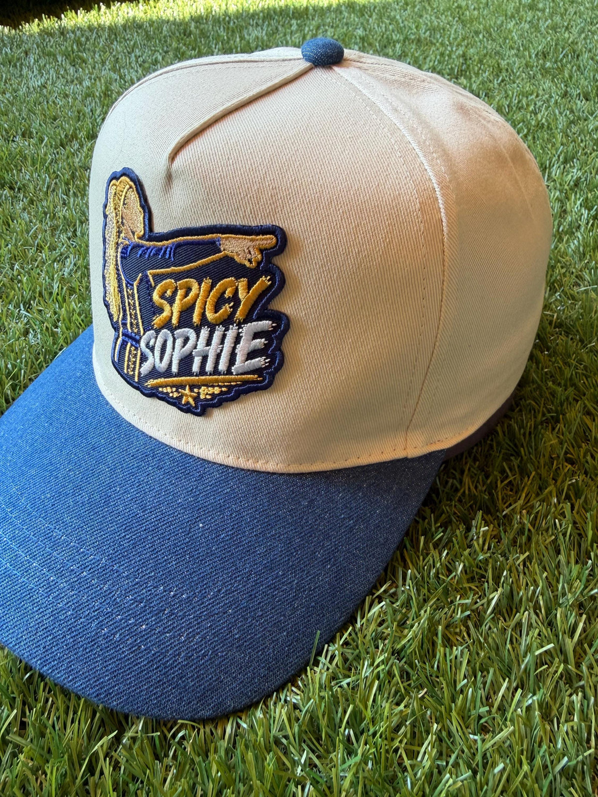 Spicy Sophie on a custom canvas hat with denim brim