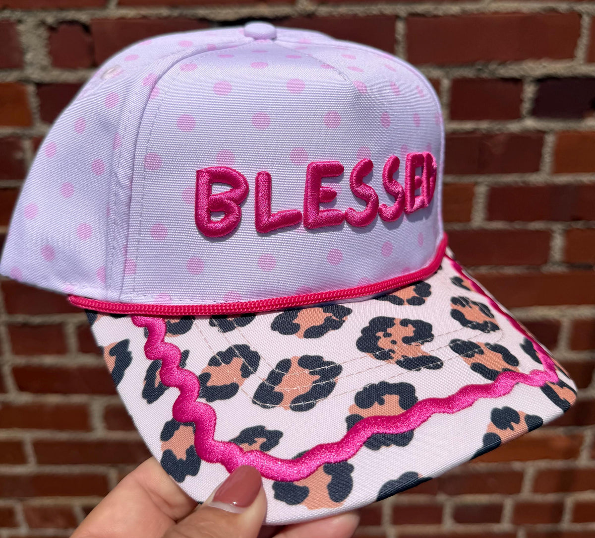 BLESSED embroidered canvas trucker hat with adjustable snap closure