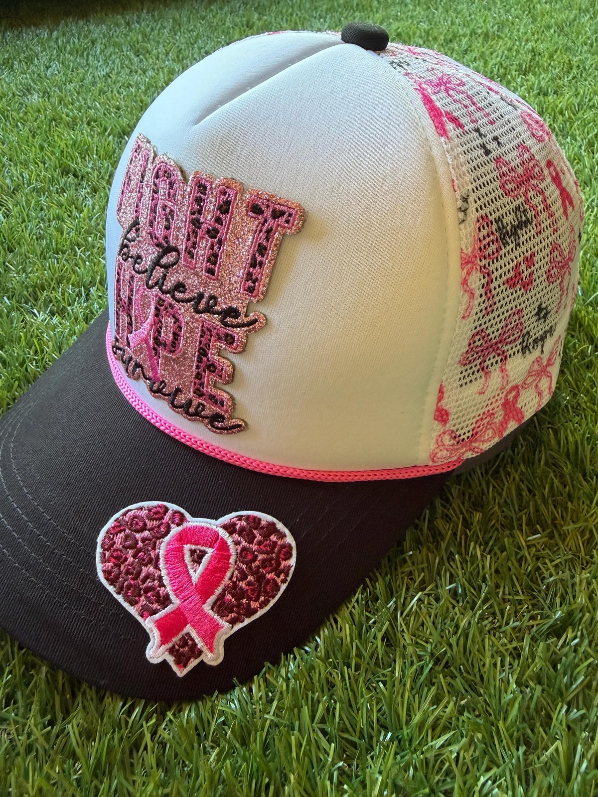 Fight Believe Hope Survive breast cancer awareness custom mesh trucker hat with pink ribbon detailing on the mesh