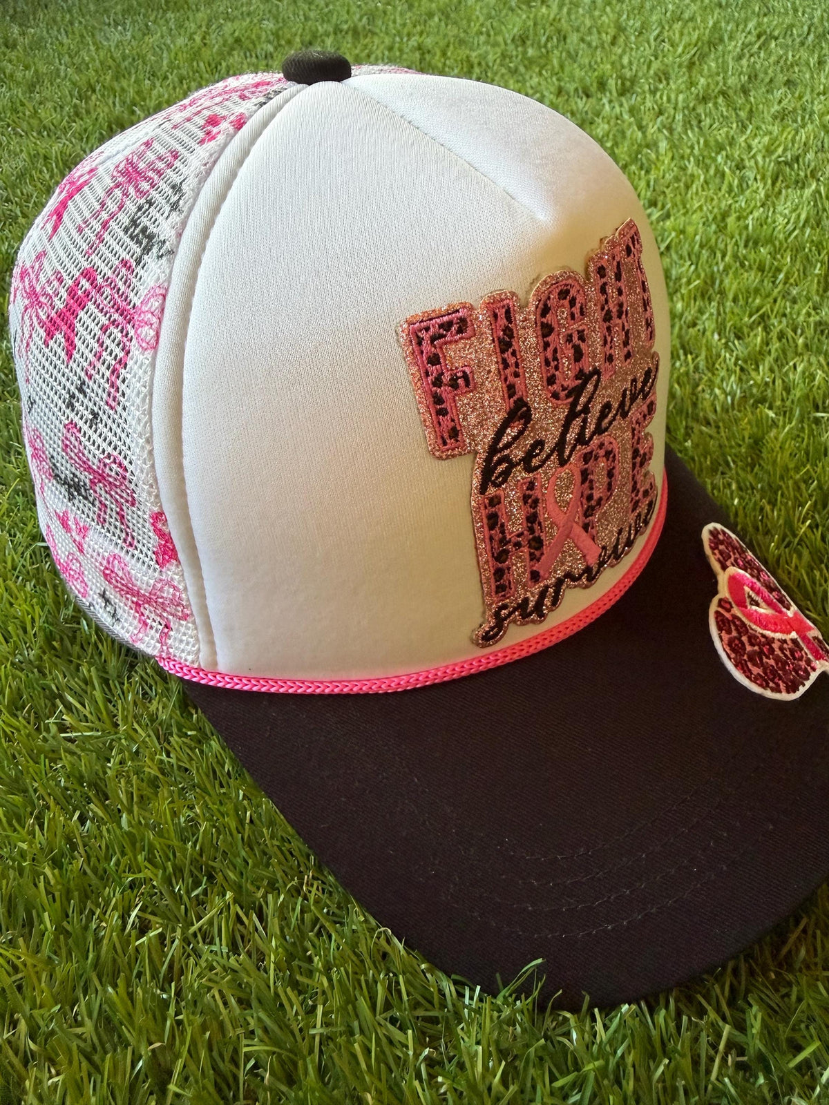 Fight Believe Hope Survive breast cancer awareness custom mesh trucker hat with pink ribbon detailing on the mesh