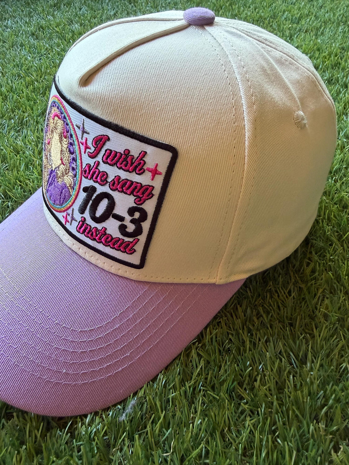I Wish She Sang 10-3 Instead on a custom canvas trucker hat with a coordinating lavender brim
