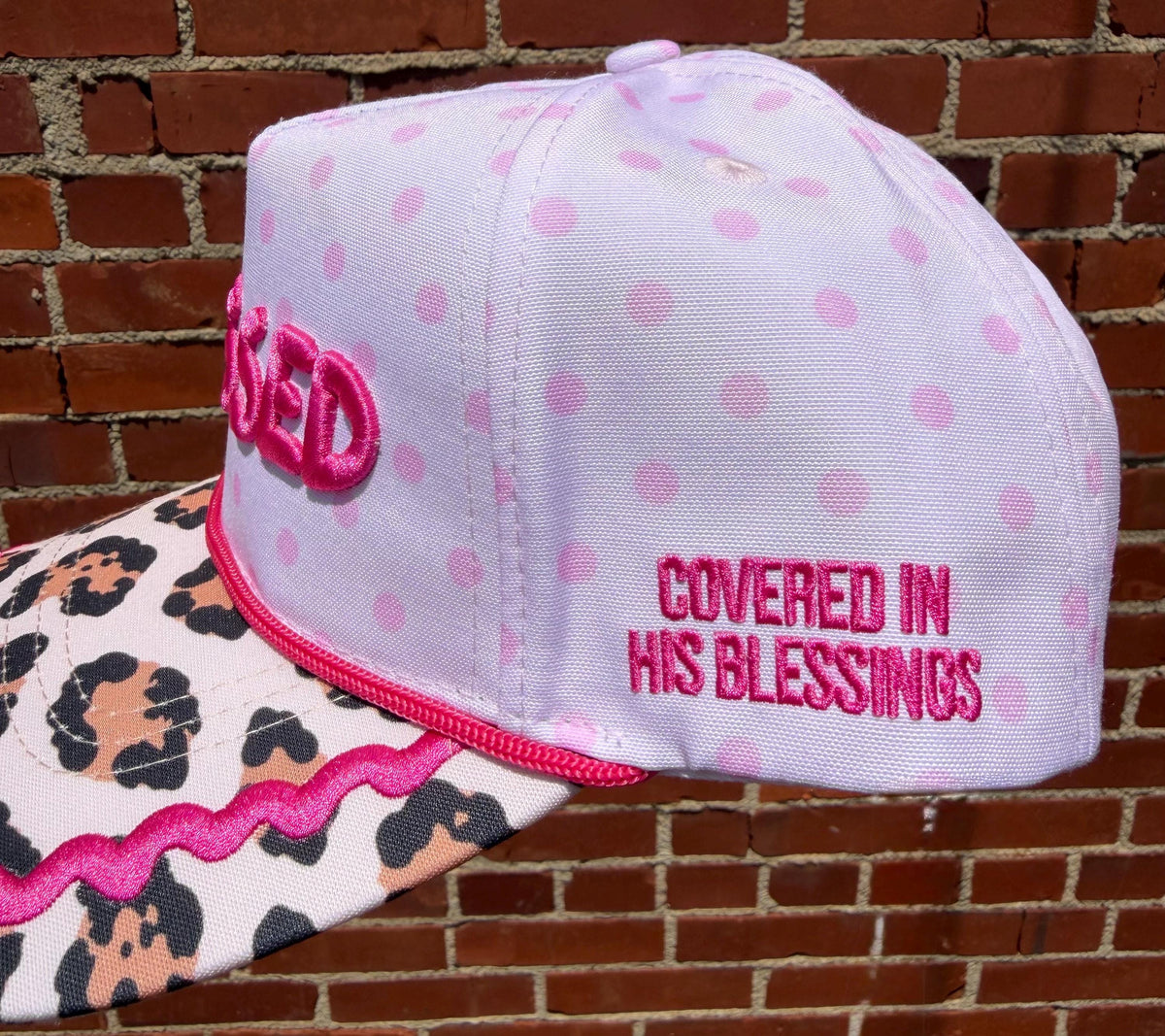 BLESSED embroidered canvas trucker hat with adjustable snap closure