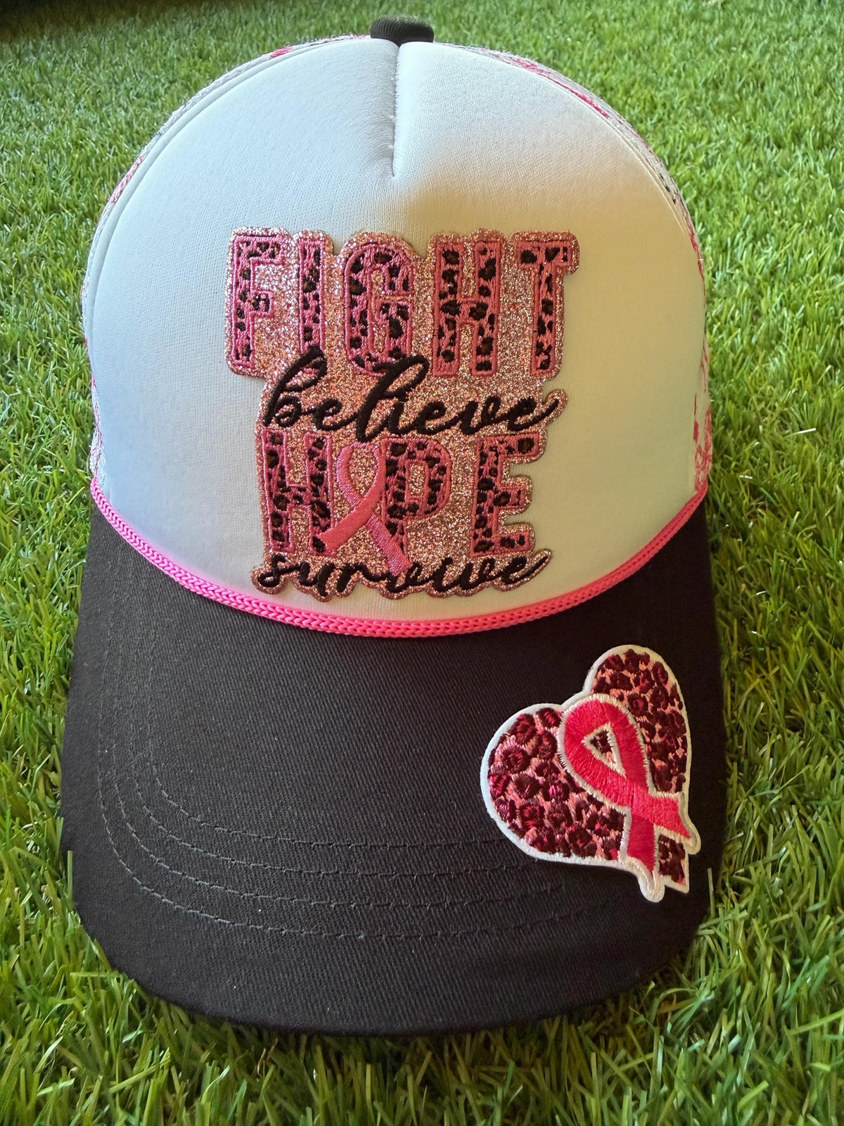 Fight Believe Hope Survive breast cancer awareness custom mesh trucker hat with pink ribbon detailing on the mesh