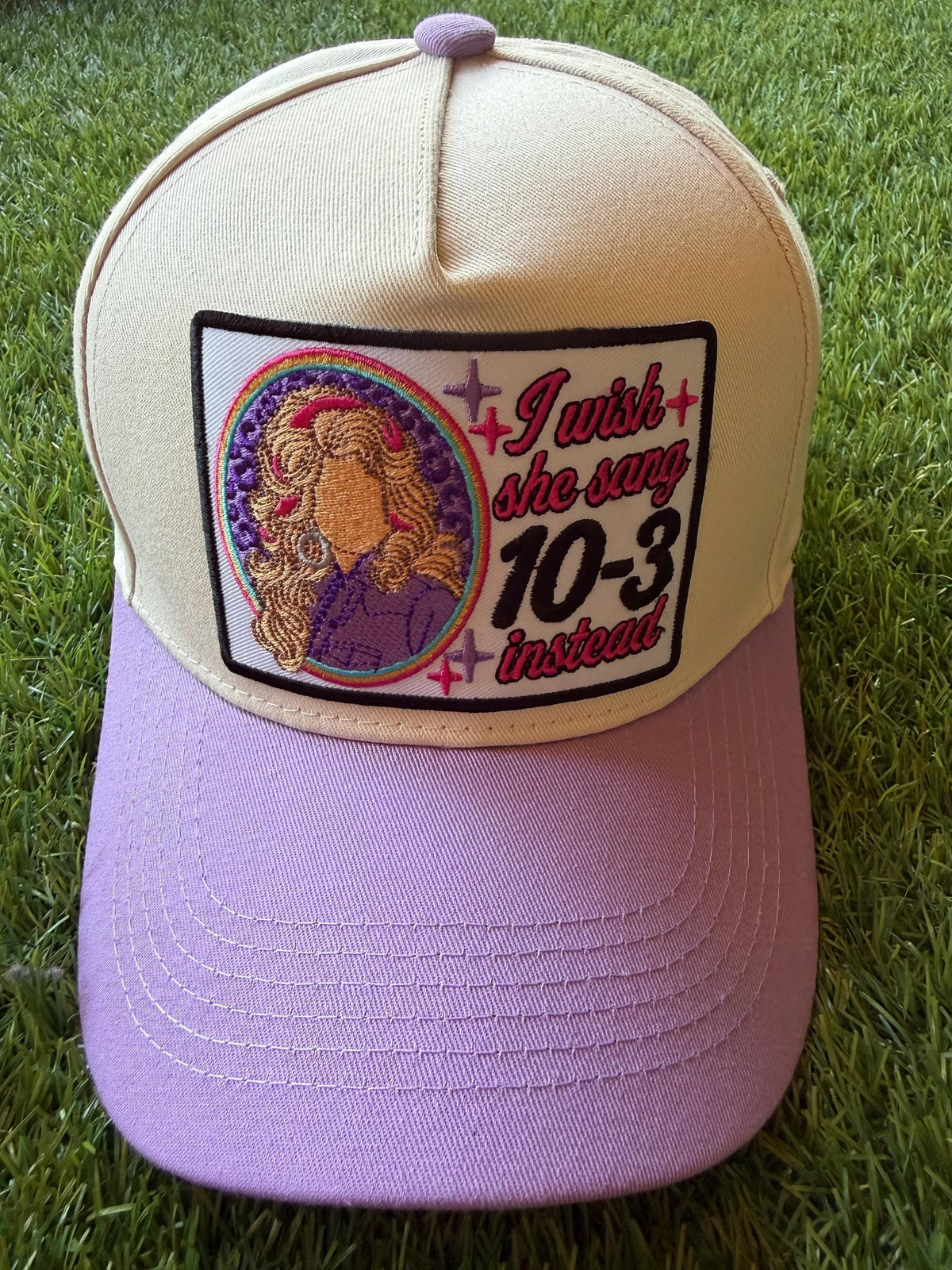 I Wish She Sang 10-3 Instead on a custom canvas trucker hat with a coordinating lavender brim