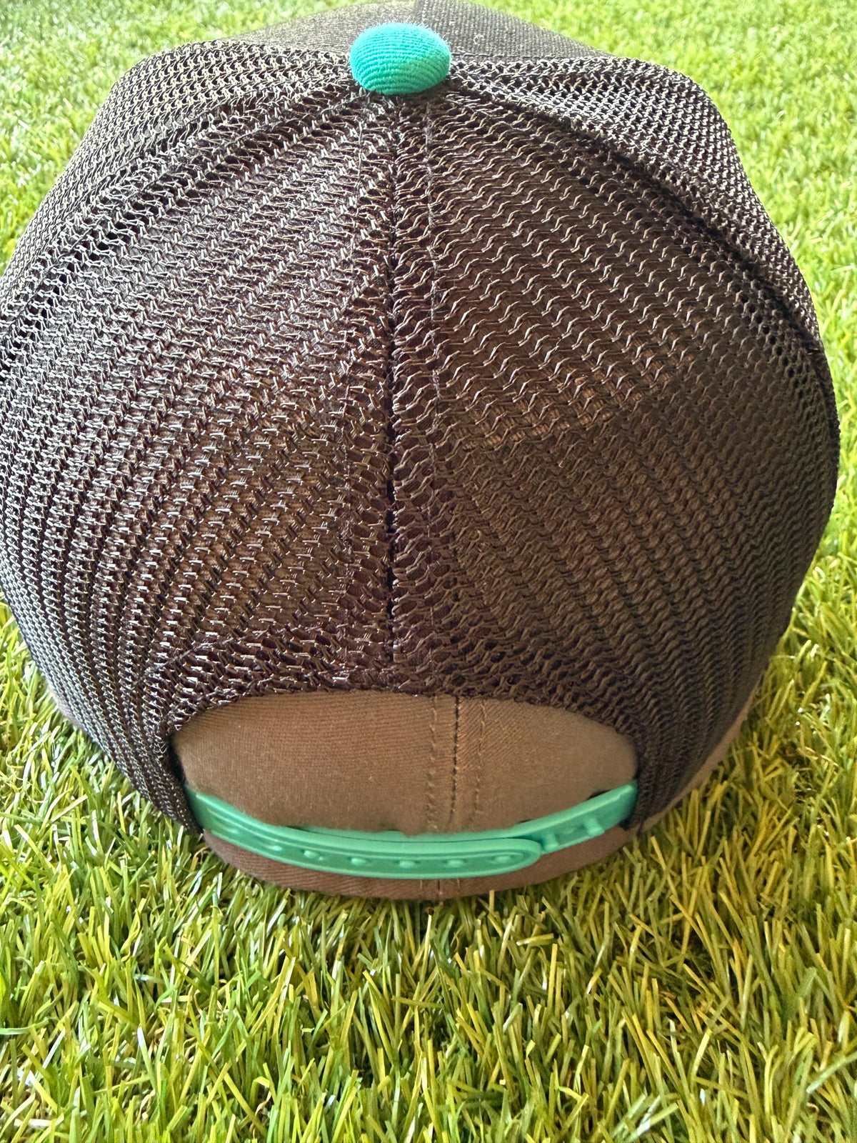 Future Golden Girl on a custom canvas trucker hat with a leopard brim and teal rope detailing