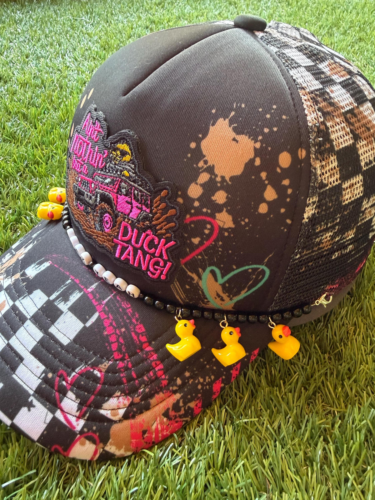 Ain’t Nothin But A Duck Tang on a custom mesh trucker hat with a duck hat chain