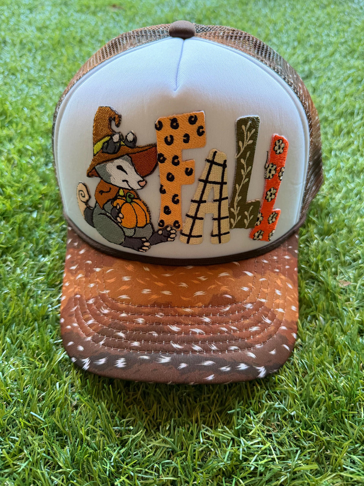FALL embroidered patch on a custom mesh trucker deer print brim