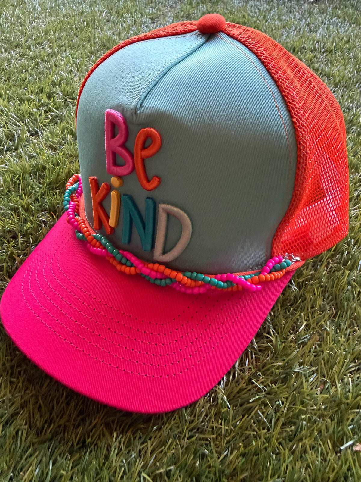 BE KIND embroidered word patch on custom canvas/mesh trucker hat with braided hat chain