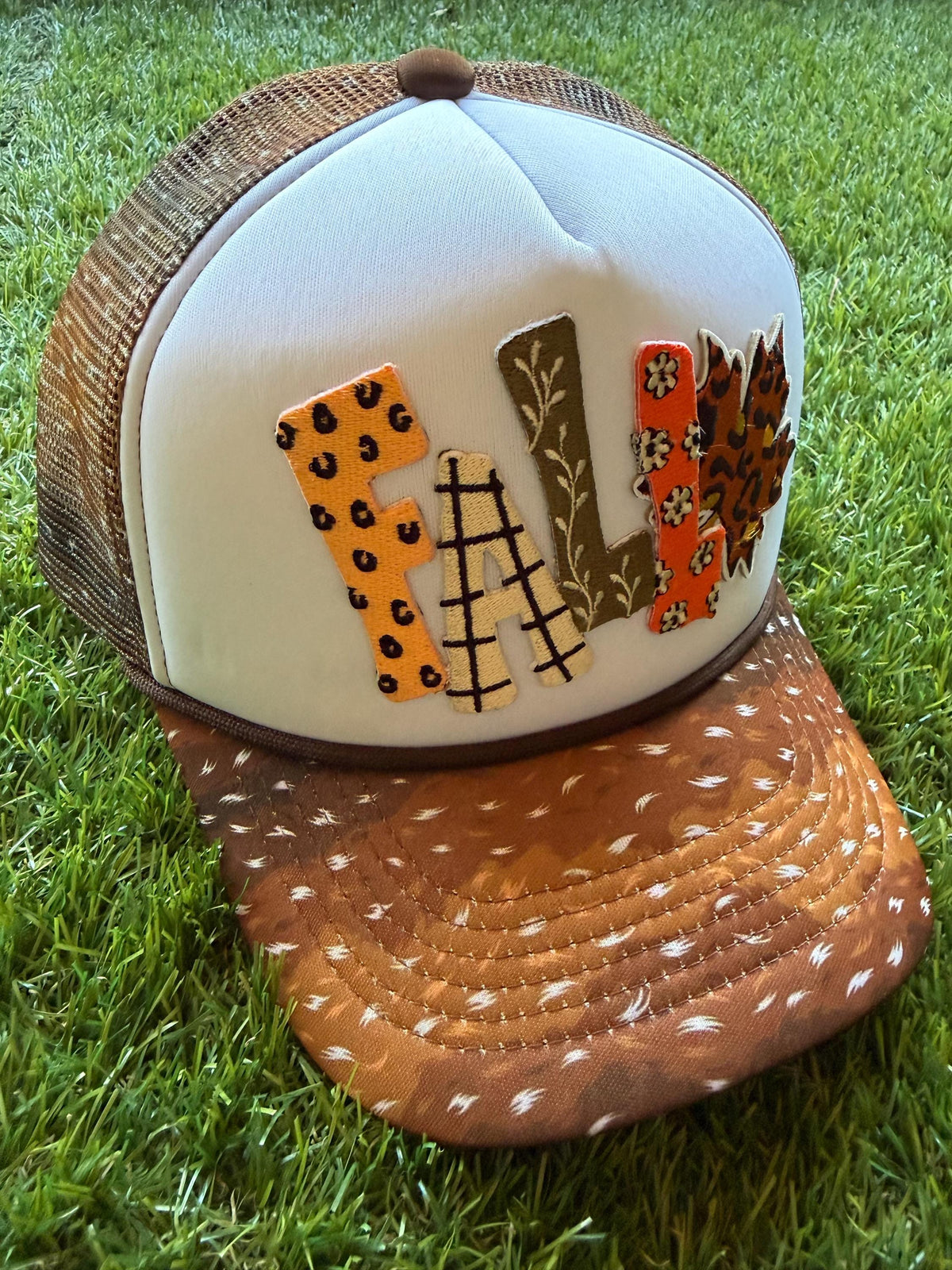 FALL on custom mesh trucker hat with deer print brim and mesh