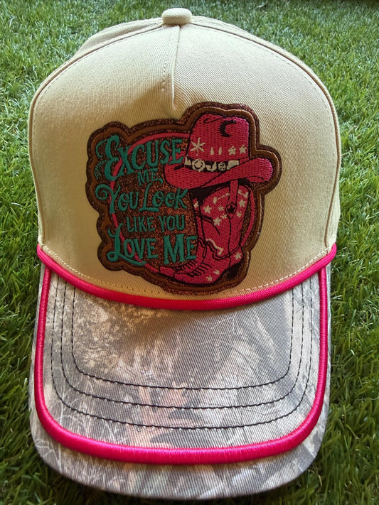 Excuse Me You Look Like You Love Me on custom canvas trucker hat with camouflage brim and hot pink trim