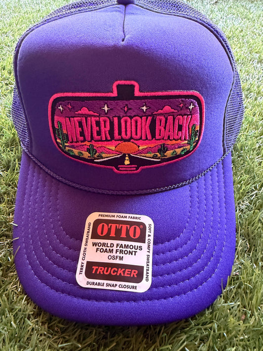 Never Look Back embroidered patch on a custom mesh trucker hat