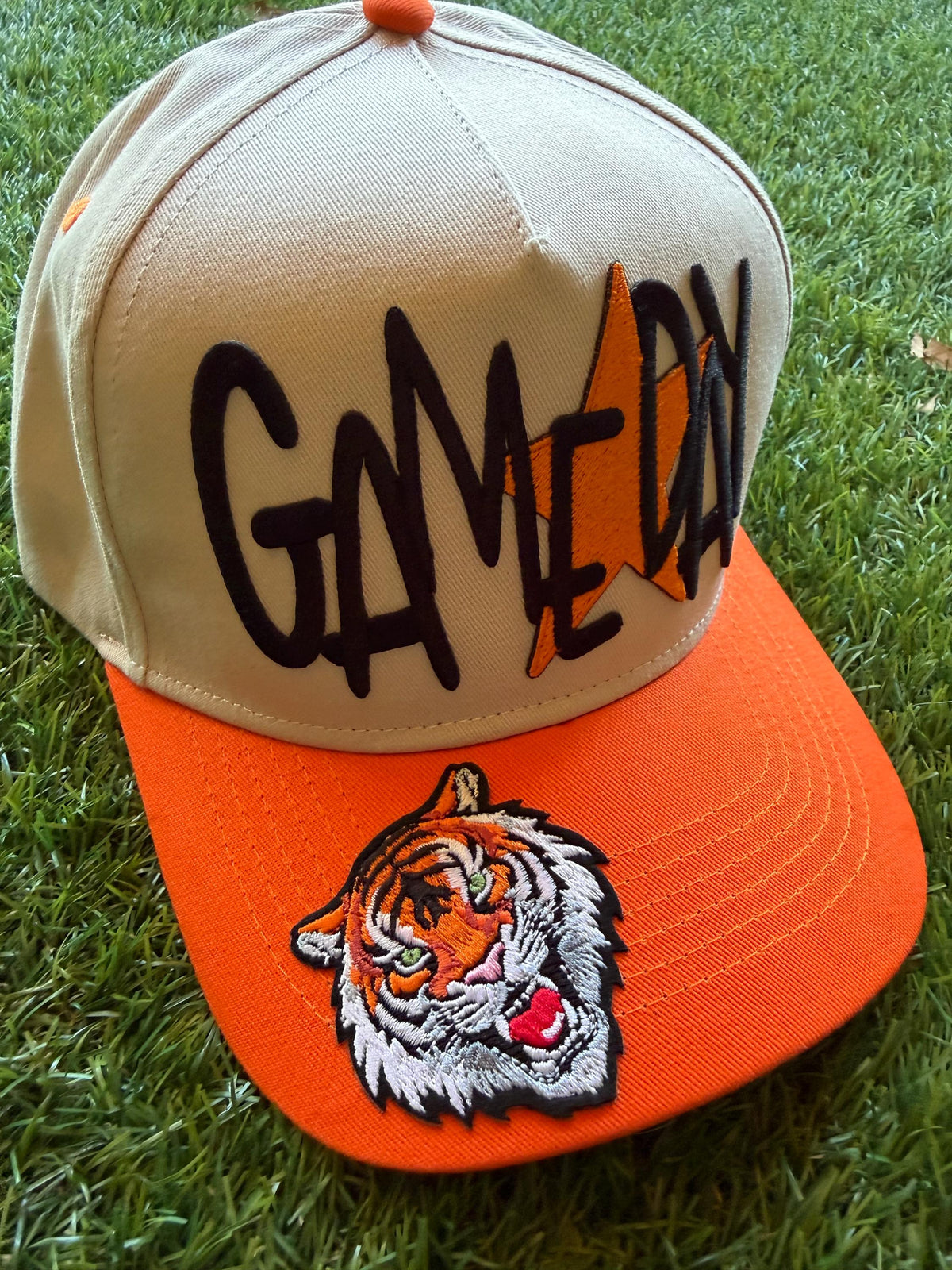 GAMEDAY GO TIGERS embroidered patch on custom canvas trucker hat with a football theme detail on side
