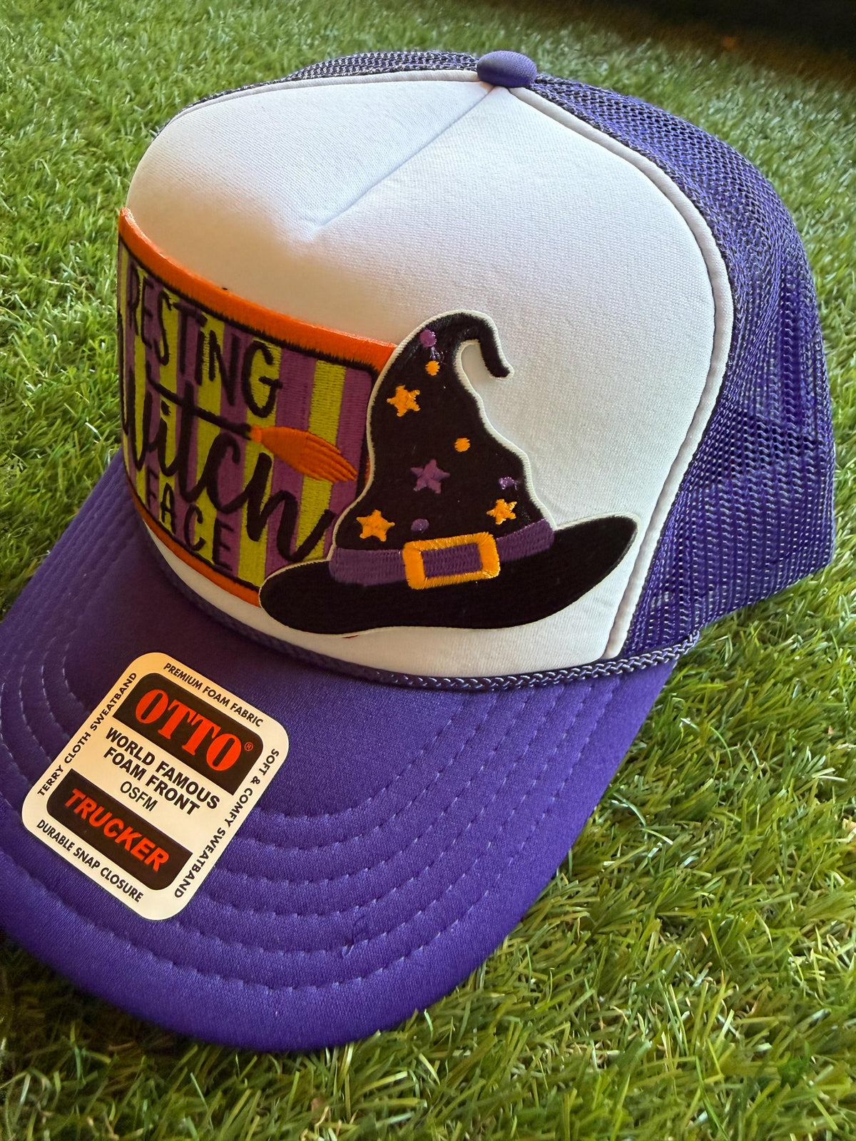 Resting Witch Face embroidered patch on custom mesh trucker hat