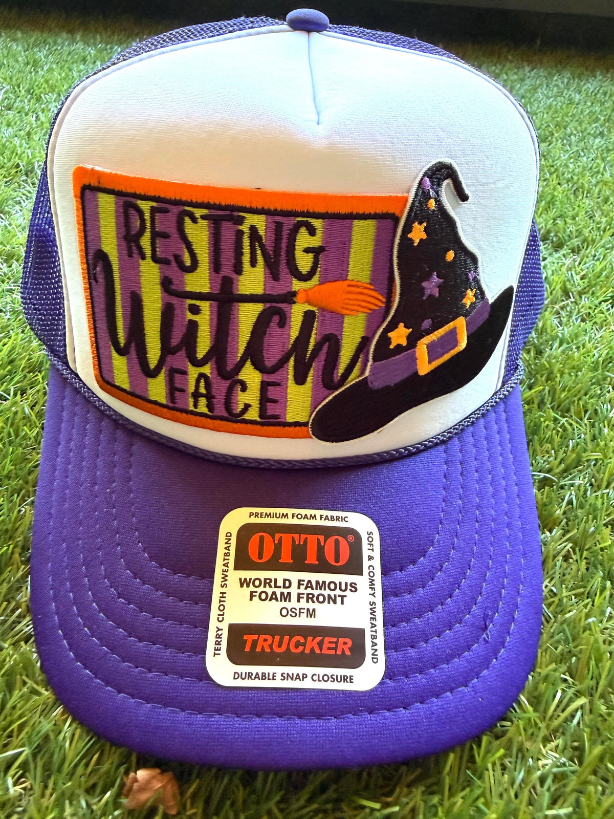Resting Witch Face embroidered patch on custom mesh trucker hat