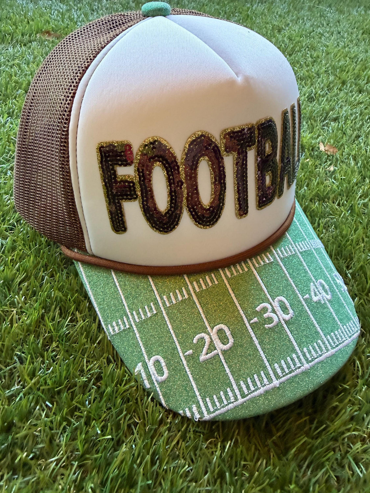 FOOTBALL sequined patch on a custom mesh trucker with glitter brim