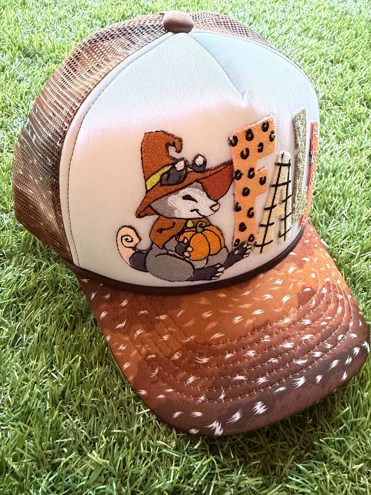 FALL embroidered patch on a custom mesh trucker deer print brim