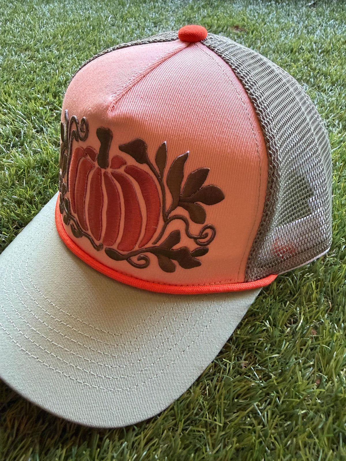 Pumpkin embroidered patch on custom canvas front trucker hat with mesh back