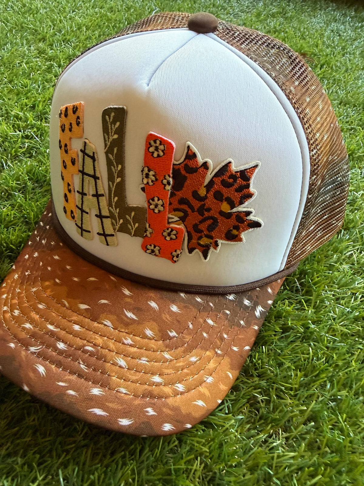 FALL on custom mesh trucker hat with deer print brim and mesh