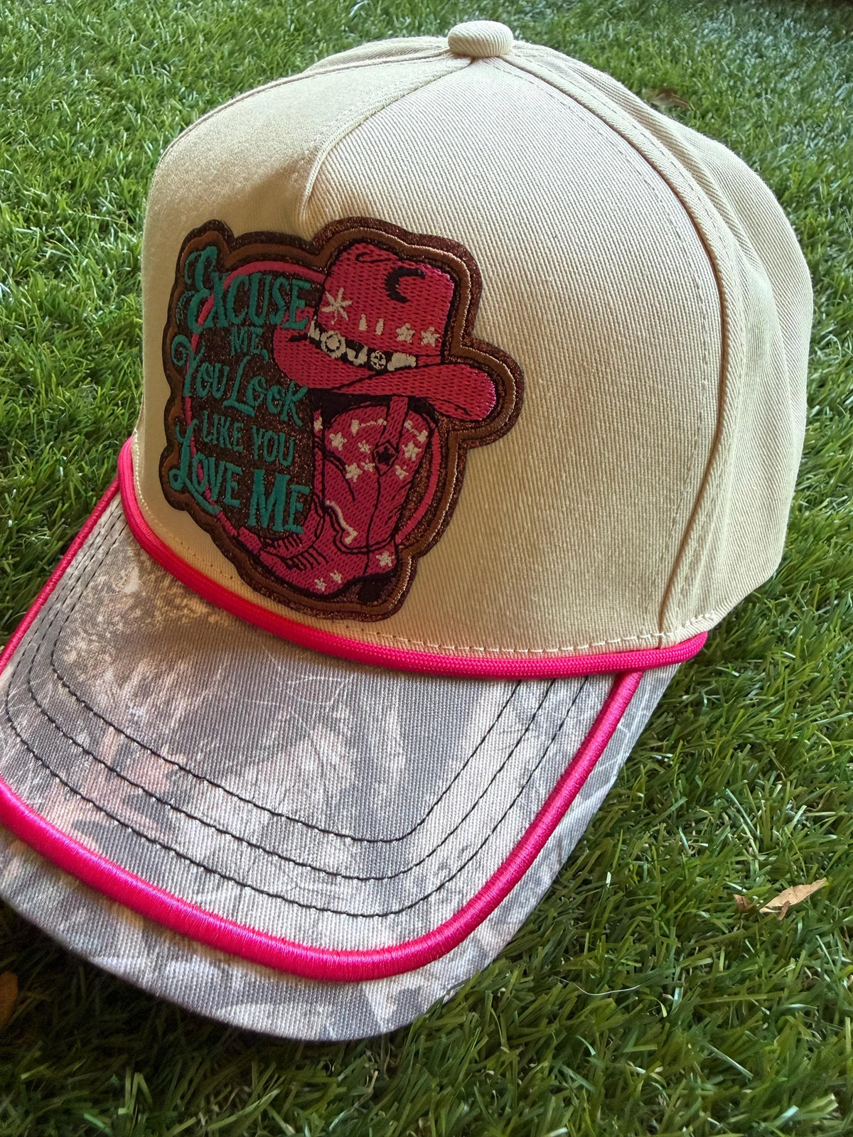 Excuse Me You Look Like You Love Me on custom canvas trucker hat with camouflage brim and hot pink trim