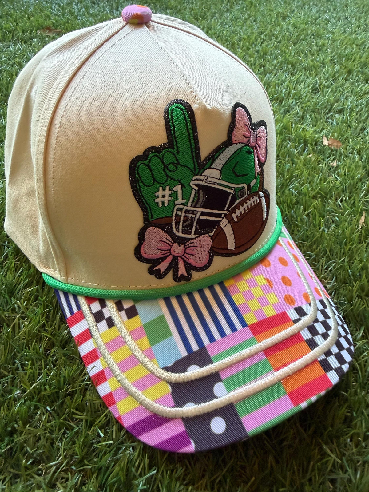 Girlie Football Themed embroidered patch on a custom canvas trucker hat with cute brim