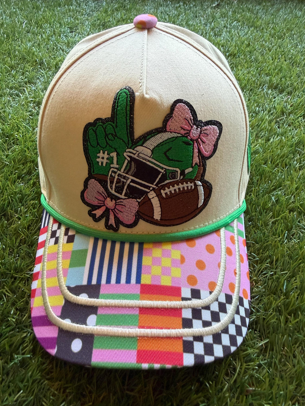 Girlie Football Themed embroidered patch on a custom canvas trucker hat with cute brim
