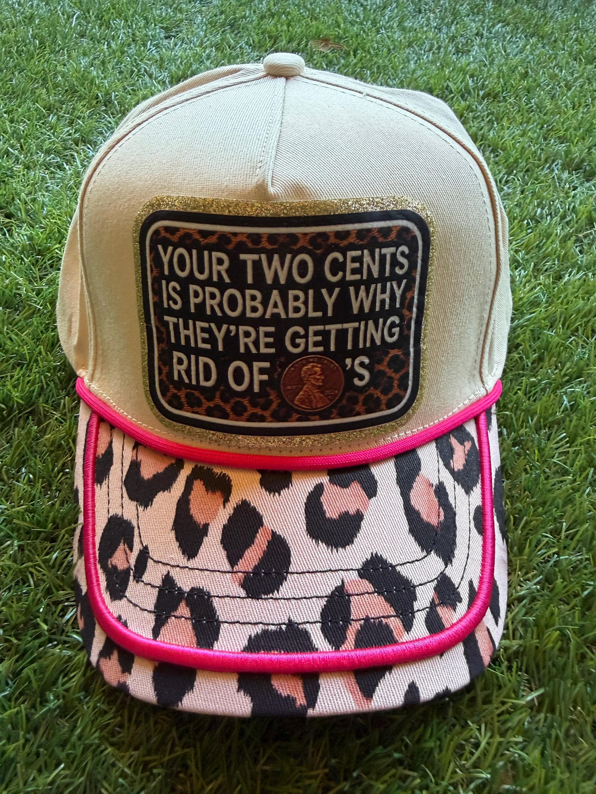 Your Two Cents Are Probably Why They Are Getting Rid of Pennies on a custom canvas trucker hat with leopard brim and hot pink detail