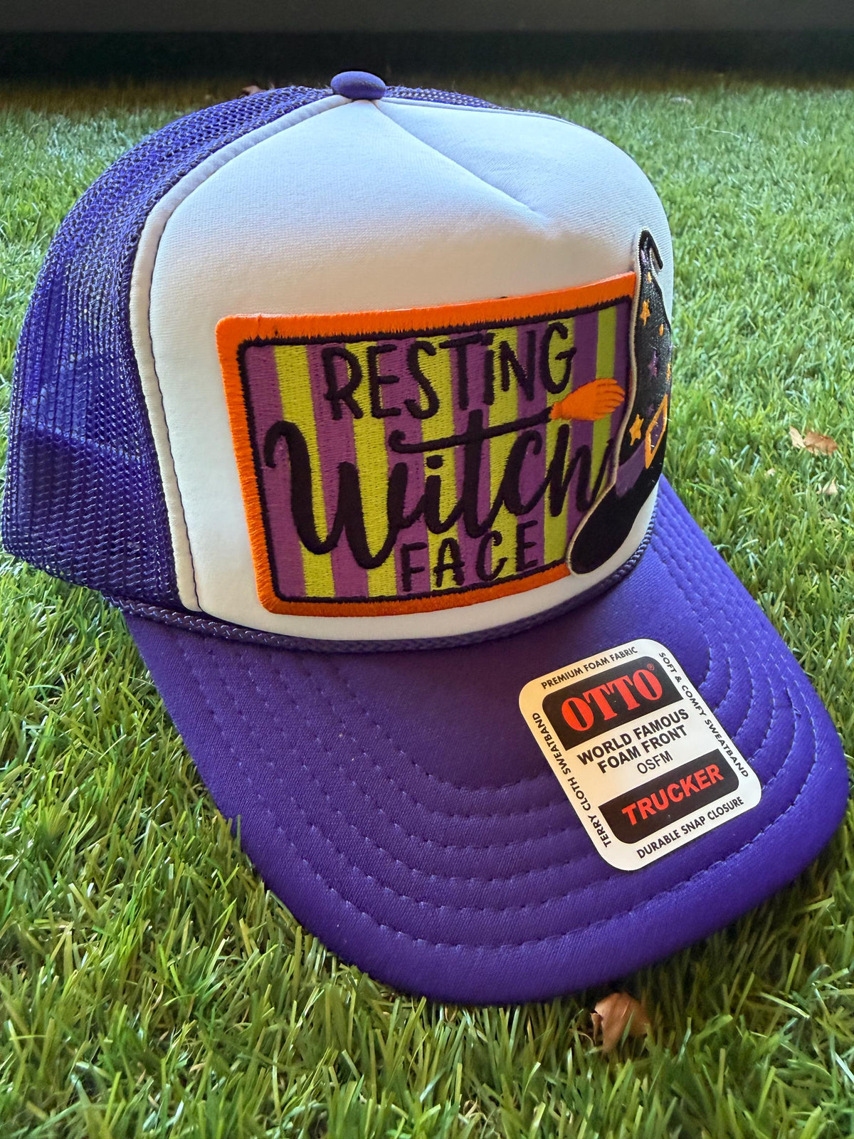 Resting Witch Face embroidered patch on custom mesh trucker hat