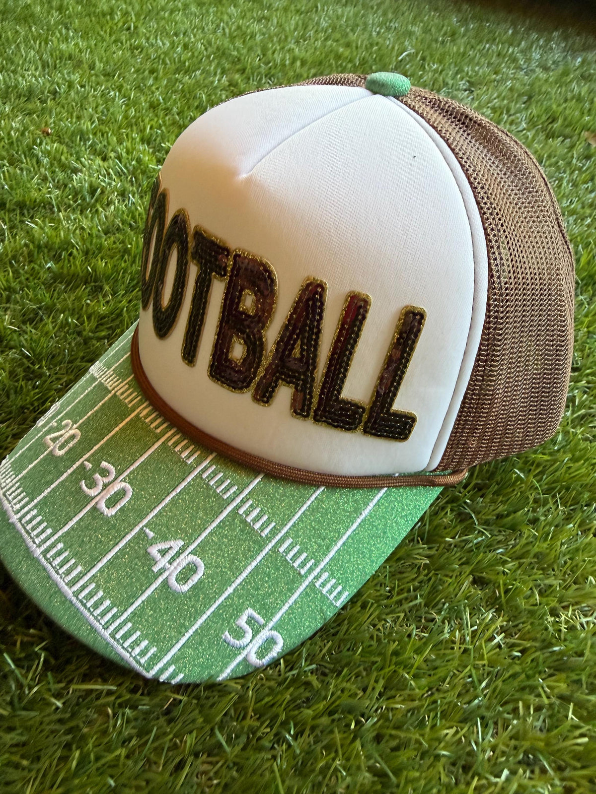 FOOTBALL sequined patch on a custom mesh trucker with glitter brim